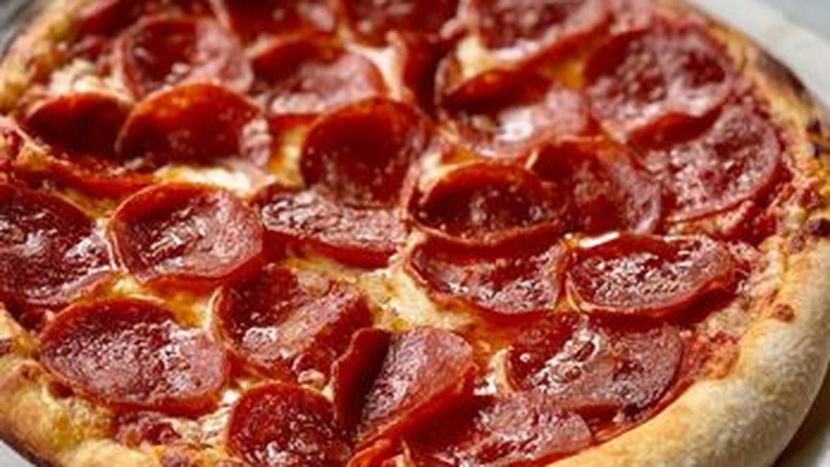 Pepperoni pizza at Skybox Taphouse Waikiki — crispy pepperoni on hand-crafted crust